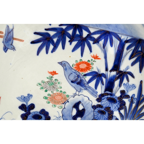 573 - A 19th century Japanese Imari Arita shell shaped serving platter painted in underglaze blue and gilt... 