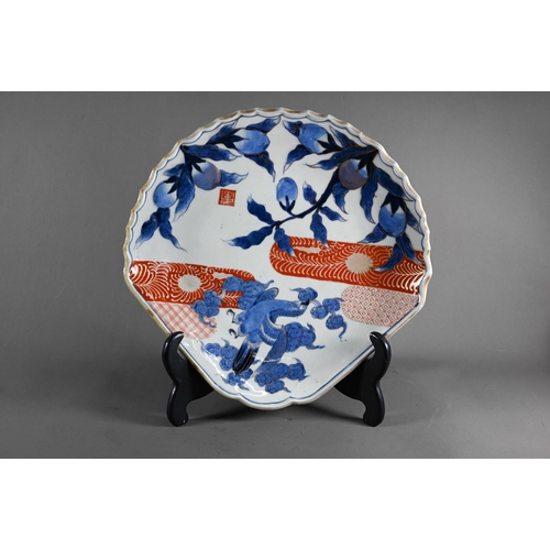 573 - A 19th century Japanese Imari Arita shell shaped serving platter painted in underglaze blue and gilt... 