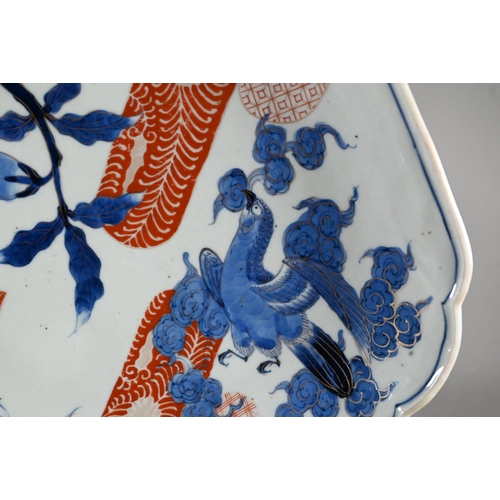 573 - A 19th century Japanese Imari Arita shell shaped serving platter painted in underglaze blue and gilt... 