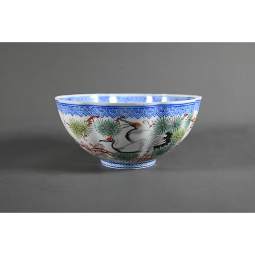 574 - A 20th century Chinese egg-shell porcelain floriform bowl, painted with red-crowned cranes and pine ... 