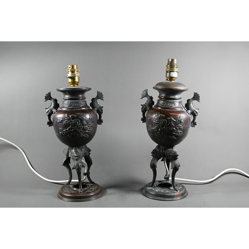 577 - A pair of late 19th century Japanese bronze vases mounted as lamps, the baluster form bodies ap... 