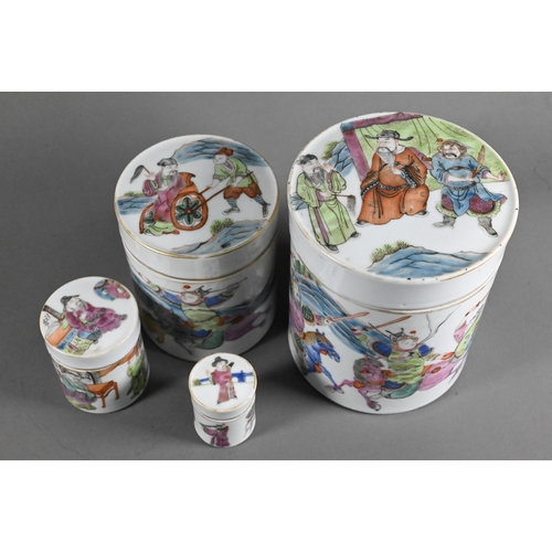 581 - A set of four Chinese 19th century famille rose nesting lidded boxes of cylindrical form, painted in... 