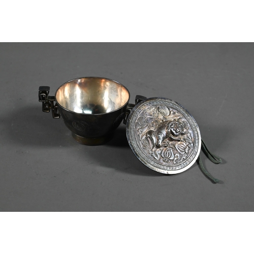 585 - A mixed lot of Asian collectibles including a 19th century South Indian silver swami ware bracelet, ... 