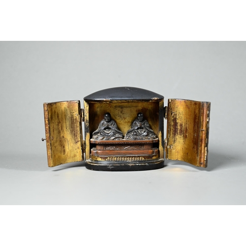 589 - A Japanese black lacquer zushi (portable shrine) Edo or Meiji period, 19th century, the two small do... 