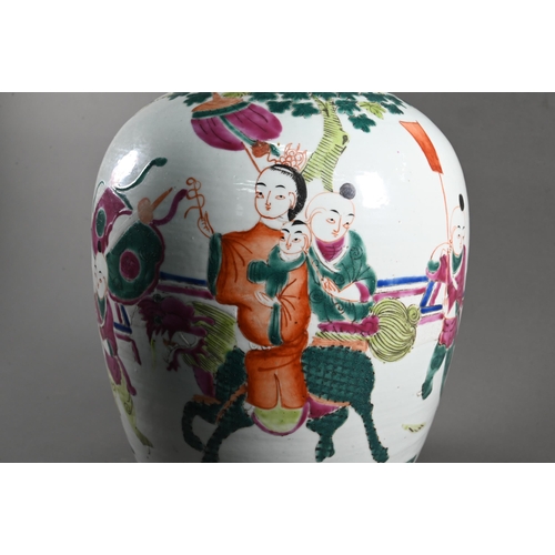 596 - A pair of 19th century Chinese famille rose ovoid vases with covers (missing finials) painted in pol... 