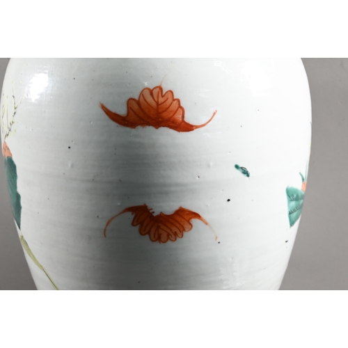 596 - A pair of 19th century Chinese famille rose ovoid vases with covers (missing finials) painted in pol... 