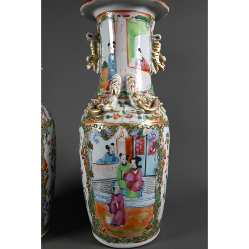 598 - A pair of 19th century Chinese canton famille rose vases, baluster form with everted foliate rims ap... 