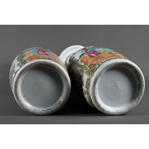 598 - A pair of 19th century Chinese canton famille rose vases, baluster form with everted foliate rims ap... 