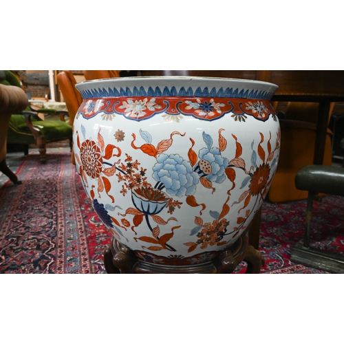 599 - A large 20th century Chinese Imari fish bowl jardiniere, the exterior painted with floral designs, t... 