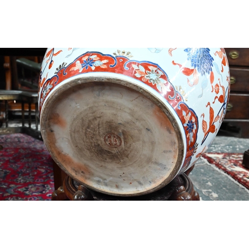 599 - A large 20th century Chinese Imari fish bowl jardiniere, the exterior painted with floral designs, t... 