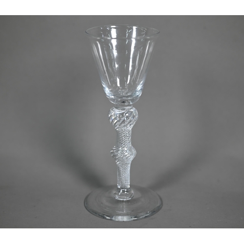 612 - A Georgian cordial glass with tapering bowl on double knop air-twist stem with dome foot, 15 cm