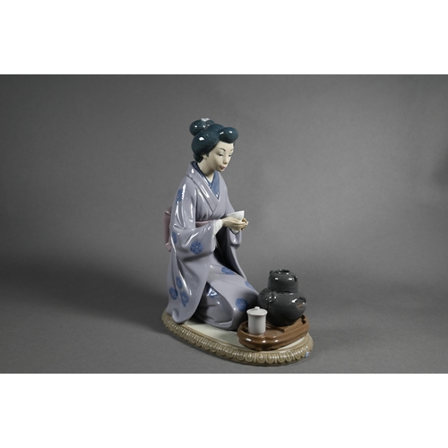 619 - Three Lladro figures, Japanese Girl Serving Tea 5122, Schoolgirl 5148 (on 'E') and Thursday's Child ... 