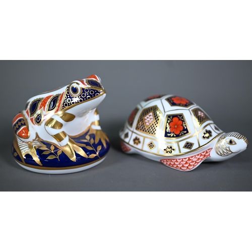 628 - Two Royal Crown Derby figures, snail and Fish, to/w three paperweights with silver plugs: Frog, Seal... 