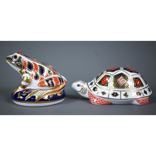 628 - Two Royal Crown Derby figures, snail and Fish, to/w three paperweights with silver plugs: Frog, Seal... 