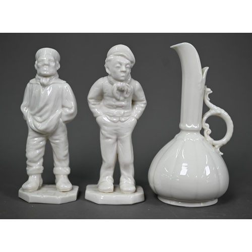 637 - A pair of Victorian Royal Worcester white glazed china figures of a sailor and a street-urchin, thei... 