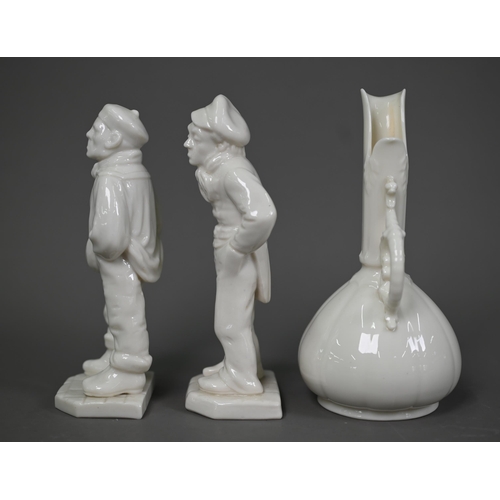 637 - A pair of Victorian Royal Worcester white glazed china figures of a sailor and a street-urchin, thei... 