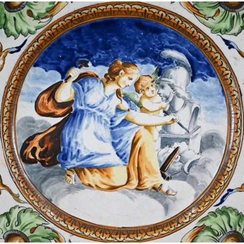 645 - A pair of 19th century Italian majolica chargers in the Istoriato tradition, depicting Jupiter and V... 