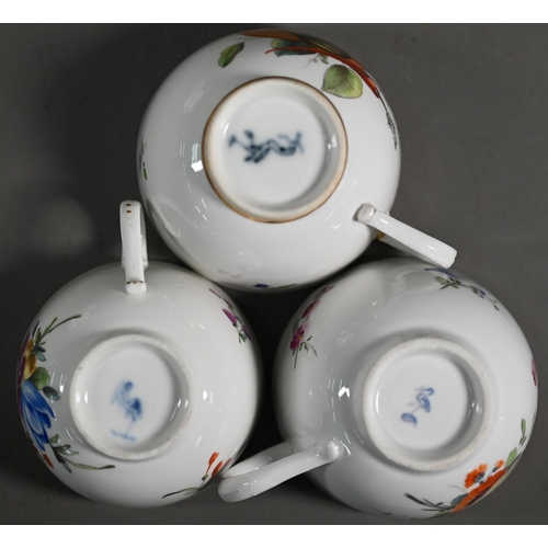 649 - Three 18th century Dutch porcelain small tea cups, The Hague factory - one finely-painted with squas... 