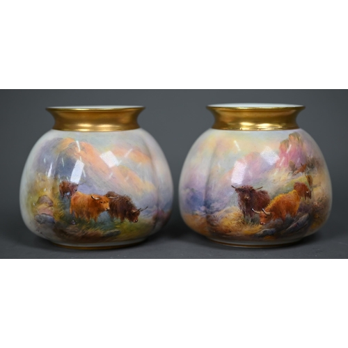 657 - A pair of Royal Worcester vases, with gilded rims, painted with Highland cattle by Harry Stinton, th... 