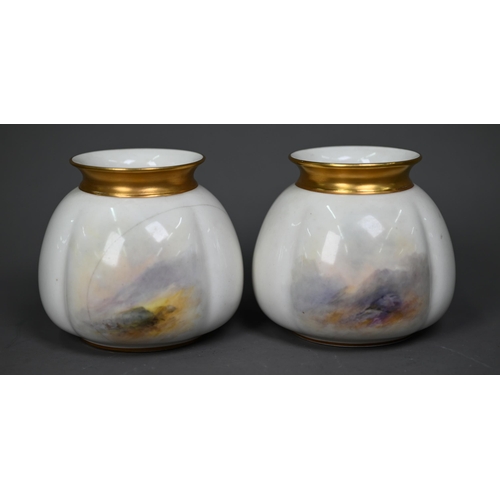 657 - A pair of Royal Worcester vases, with gilded rims, painted with Highland cattle by Harry Stinton, th... 