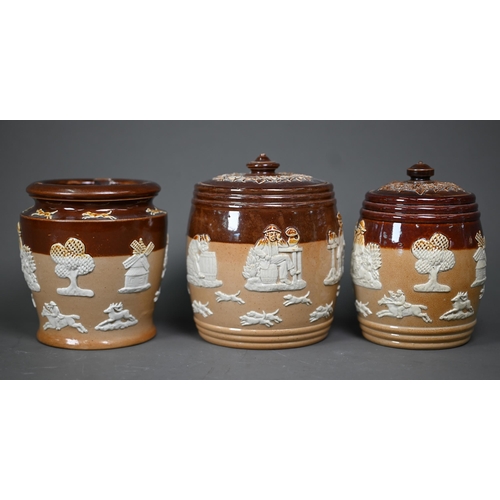 671 - Two Victorian Royal Doulton stoneware tobacco barrels with bucolic scenes and a tobacco jar with sim... 