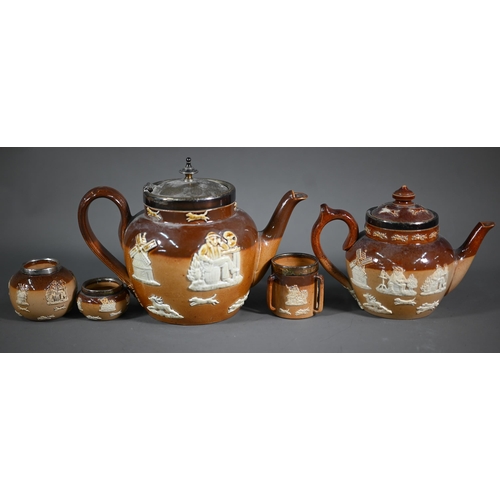 675 - An Edwardian Royal Doulton stoneware 'Harvest' bachelor tea service, the teapot with silver collar a... 