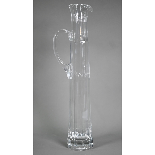 688 - A set of seven Thomas Goode large glass champagne flutes, 40 cm high, to/w a similar tall and slende... 