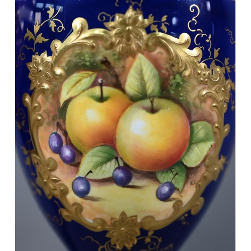 691 - A pair of boxed Coalport blue-ground urns and covers, the reserves painted with fruit still lifes ar... 