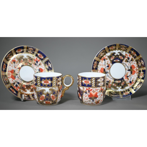 694 - A Davenport coffee pot with cream and sugar pair, decorated in the Crown Derby Imari manner, to/w fi... 