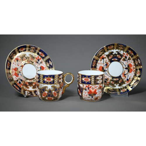 694 - A Davenport coffee pot with cream and sugar pair, decorated in the Crown Derby Imari manner, to/w fi... 