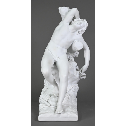 697 - A Parian porcelain figure of a drunken Bacchanalian youth, resting on a convenient rock, 30 cm high