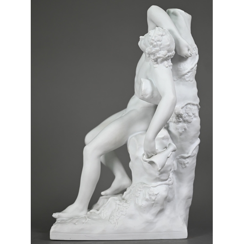 697 - A Parian porcelain figure of a drunken Bacchanalian youth, resting on a convenient rock, 30 cm high