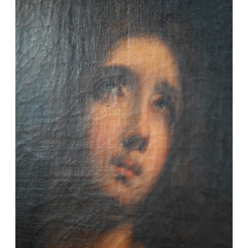 739 - A 19th century oil on canvas portrait of a female saint, 46 x 35 cm