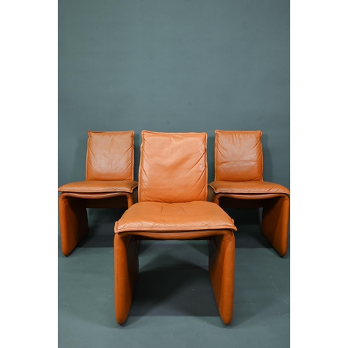 905 - In the manner of Mario Bellini, a set of six Italian tan leather dining chairs in a similar  style t... 