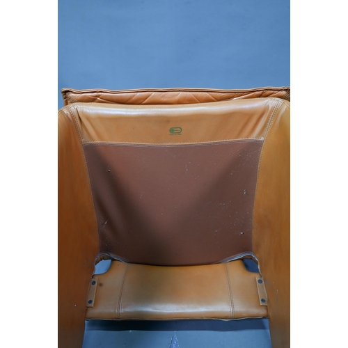 905 - In the manner of Mario Bellini, a set of six Italian tan leather dining chairs in a similar  style t... 