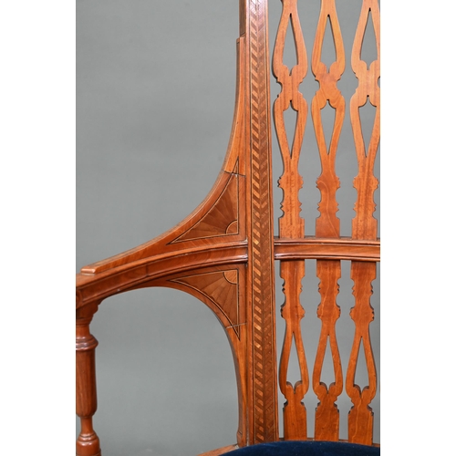 911 - A Victorian Sheraton style inlaid satinwood chair, with fret cut piered spats over a fabric panelled... 