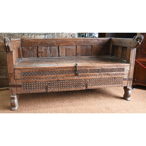 914 - A substantial Rajasthan teak 'horse head' box bench, with hinged storage compartment, 162 cm w x 87 ... 