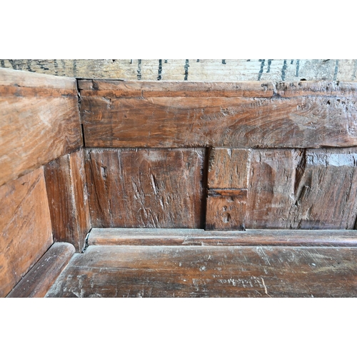 914 - A substantial Rajasthan teak 'horse head' box bench, with hinged storage compartment, 162 cm w x 87 ... 