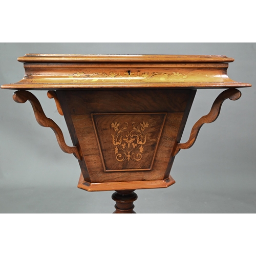 915 - Victorian inlaid mahogany work table, the interior paper lined, raised on hip carved quad legs to br... 