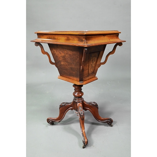 915 - Victorian inlaid mahogany work table, the interior paper lined, raised on hip carved quad legs to br... 