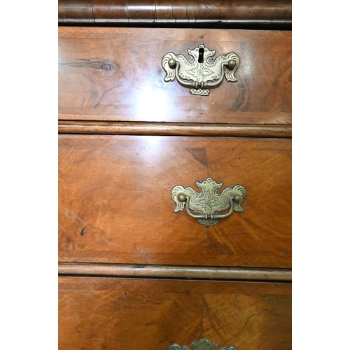 916 - A George III feather-banded walnut chest on stand, composed of two short over three long graduated d... 