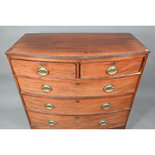 931 - A Victorian mahogany bowfront chest of two short over three long graduated drawers, raised on shaped... 