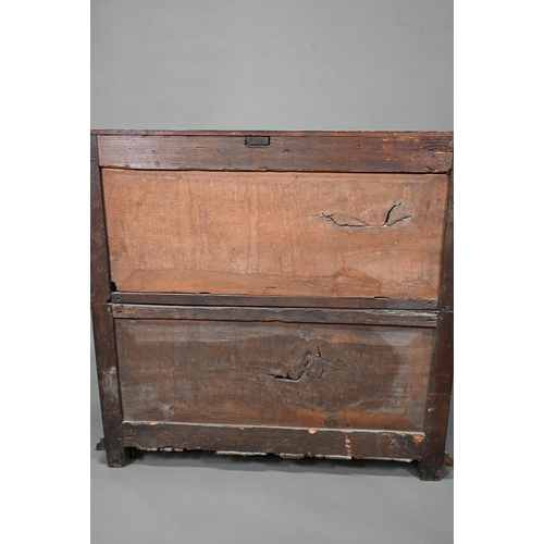 933 - A Jacobean oak chest of four long irregularly graduated drawers, with applied geometric mouldings an... 