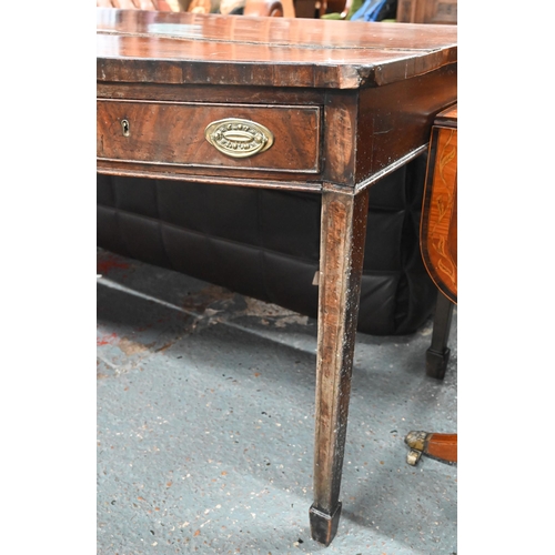 935 - A Victorian mahogany bow-fronted sideboard with three drawers, raised on square tapering legs to spa... 