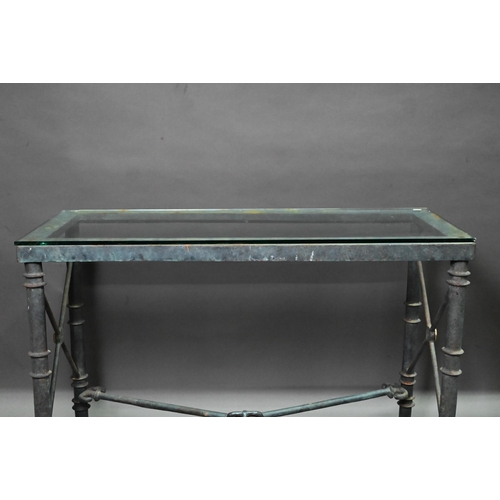 936 - A contemporary heavy cast iron framed glass top console table, 107 cm x 45 cm x 74 cm h (weathered a... 