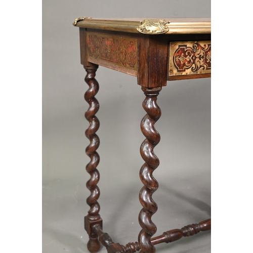 942 - A Victorian brass mounted leather top Boulle panelled writing table, with frieze drawer, raised on b... 