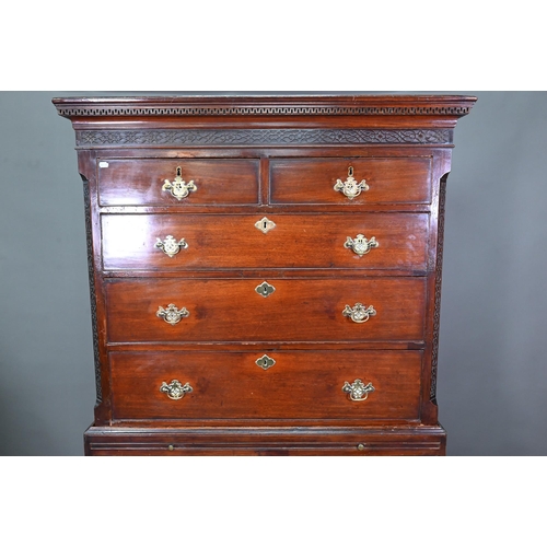 946 - A Georgian mahogany chest on chest, the blind fret moulded cornice over two short and three long gra... 