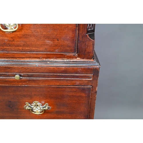 946 - A Georgian mahogany chest on chest, the blind fret moulded cornice over two short and three long gra... 