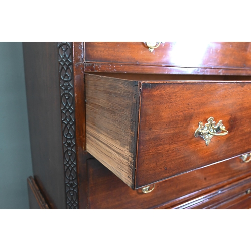 946 - A Georgian mahogany chest on chest, the blind fret moulded cornice over two short and three long gra... 