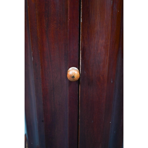 948 - A Victorian marble top mahogany cylinder pot cupboard, the fluted sides and door raised on a octagon... 